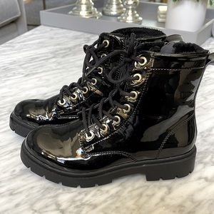 Black boot. Never been worn